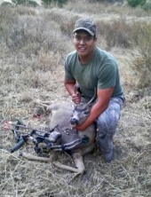 JoJo with bow hunt buck